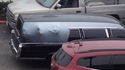Un corbillard au parking