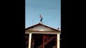 Thief in a hopeless situation on roof
