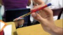 Jouer aux flêchettes en classe