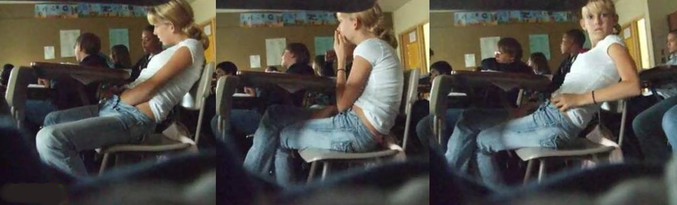 Une jeune fille qui s'ennuie en classe.