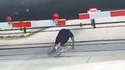 Crazy Man Rolling Under Moving Train