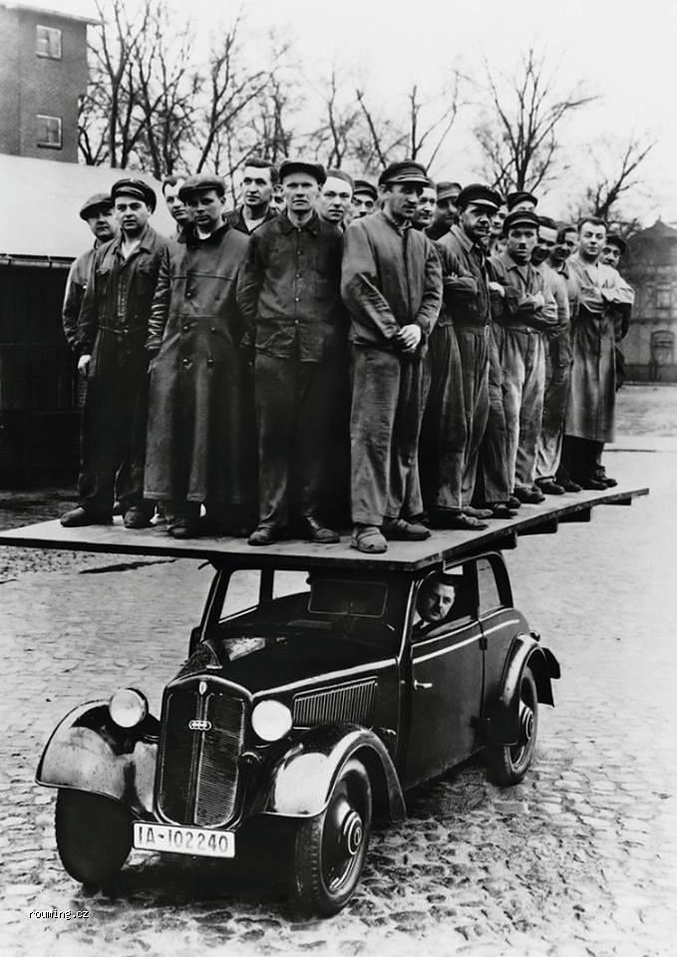 A la moitié des années 1930, l'entreprise DKW avait réalisé une voiture à faible budget, construite sur un châssis en acier et équipée d'un moteur à quatre-temps. Cette voiture était supposée contrée l'Opel Olympia qui, à l'époque, était la petite voiture la mieux vendue en Allemagne. DKW a investi beaucoup en marketing pour prouver la fiabilité de son auto alors qu'il lui était rétorqué systématiquement que ses voitures étaient 'old-fashioned'.