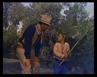 Cours de natation avec John Wayne