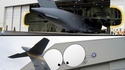 Une porte de hangar pour avion qui sort de l'ordinaire
