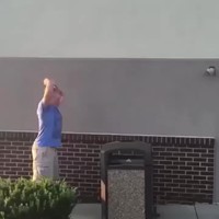 What is he doing?