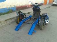 Scooter pour fauteuil roulant