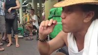 Caricaturiste sur sucette