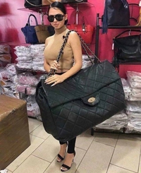 Quand tu lui dis de prendre qu'un seul sac à main pour le week end