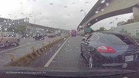 Arrogant driver in a blue Porsche