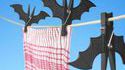 Bat-pinces à linge