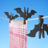 Bat-pinces à linge