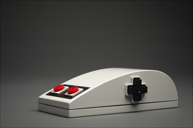 Une souris a l'effigie d'une manette Nintendo.
