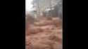 Flash flood in Jordan turns a city street into a river
