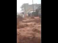 Flash flood in Jordan turns a city street into a river