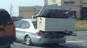 Coffre plein dans un coffre plein de voiture