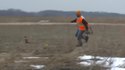 Un chasseur, son arc et sa proie