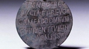 Antiquité romaine: médaille accrochée au collier d'un chien