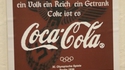Ouvre un coca-cola