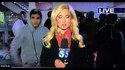 Mary Beth McDade is grabbed by stranger during live report