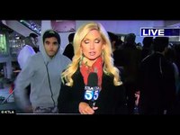 Mary Beth McDade is grabbed by stranger during live report