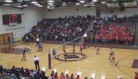Volleyball : une balle, deux personnes au sol