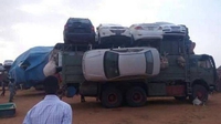 Transport de voitures au Soudan