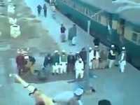 Muslims pray at the railway station