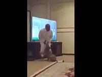 Arab playing with a young lion