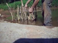 Technique de pêche avec des bâtons
