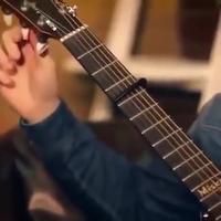 George Michael à la guitare