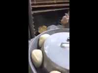 Machine for shaping dough