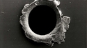 Impact d'un débris microscopique