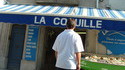la tête dans le Q